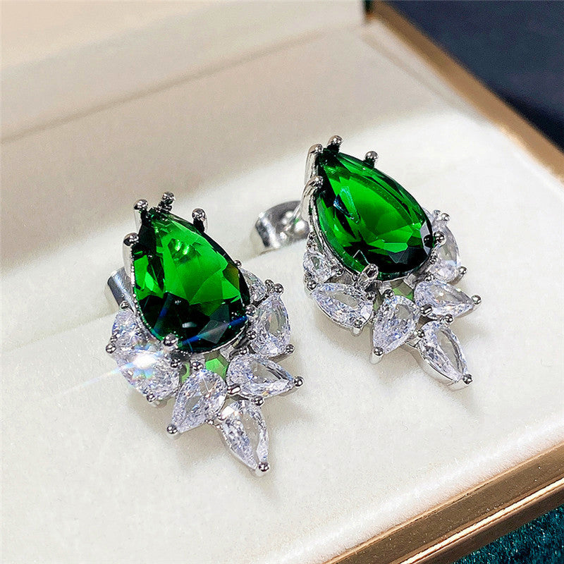 Jewels Galaxy Silver Plated American Diamond Studded Crushed Ice Cut Drop Earrings