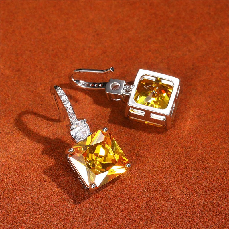 Jewels Galaxy Silver Plated AD Studded Yellow Square Shape Crushed Ice Cut Hanging Earrings