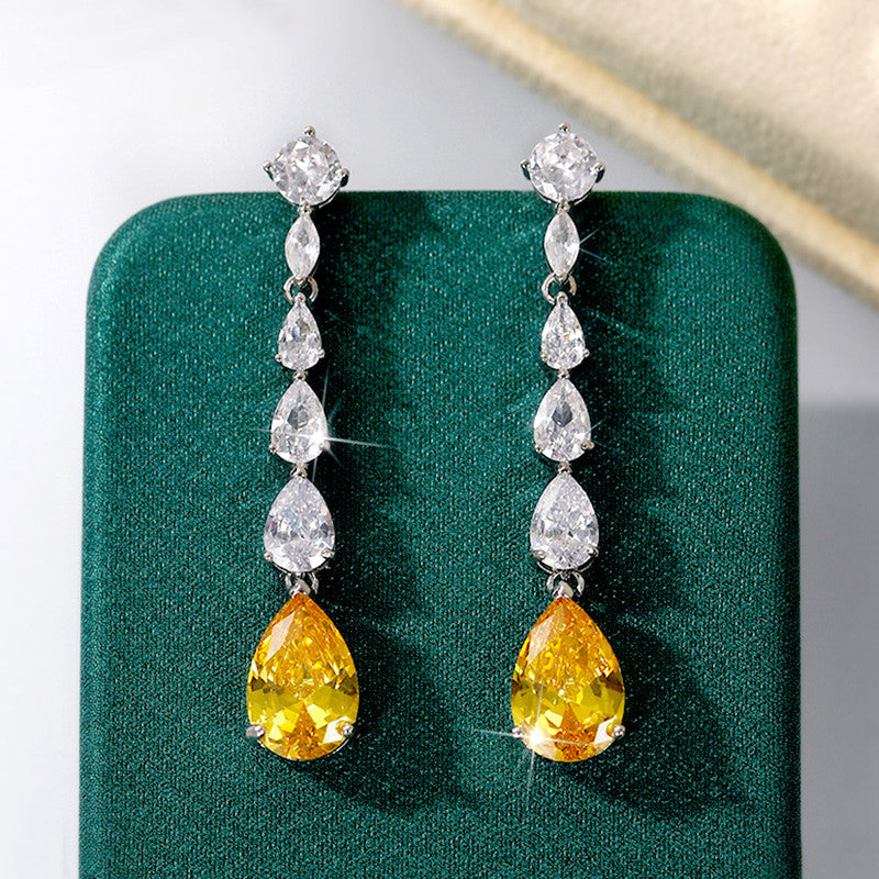 Jewels Galaxy Silver Plated AD Studded Yellow Teardrop Shape Crushed Ice Cut Drop Earrings