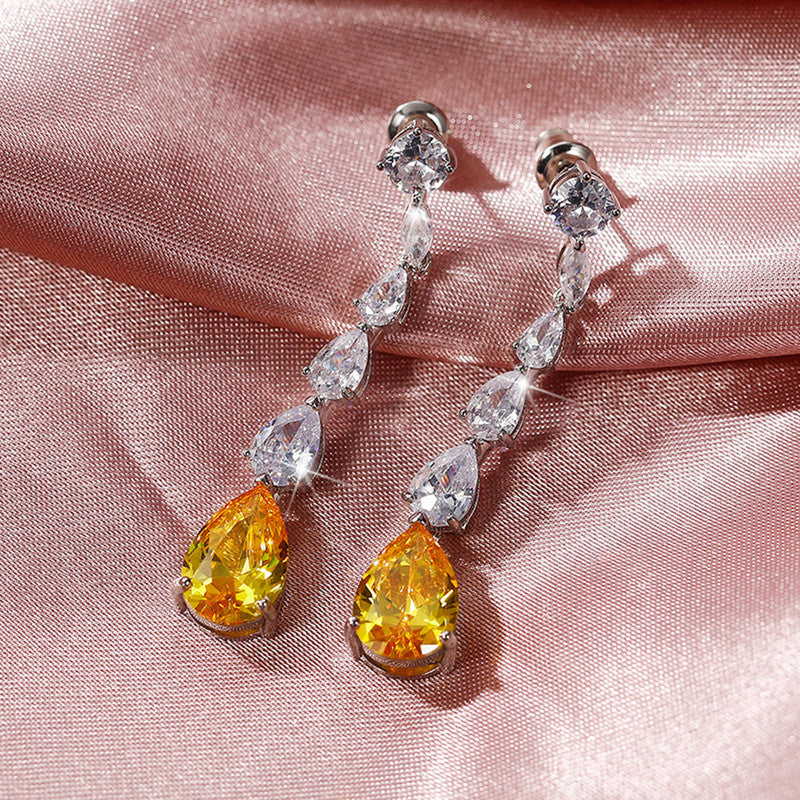 Jewels Galaxy Silver Plated AD Studded Yellow Teardrop Shape Crushed Ice Cut Drop Earrings