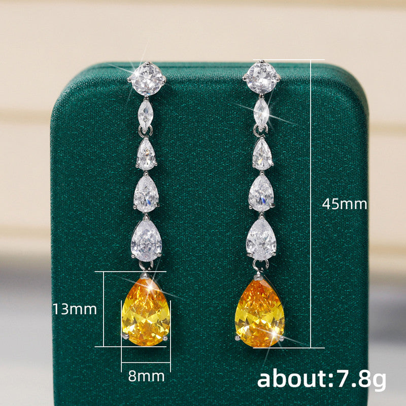 Jewels Galaxy Silver Plated AD Studded Yellow Teardrop Shape Crushed Ice Cut Drop Earrings