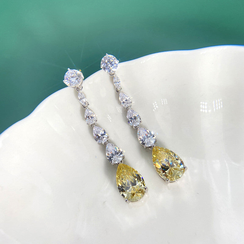 Jewels Galaxy Silver Plated AD Studded Yellow Teardrop Shape Crushed Ice Cut Drop Earrings