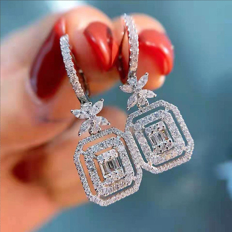 Jewels Galaxy Silver Plated American Diamond Studded Iconic Luxury Geometric Drop Earrings