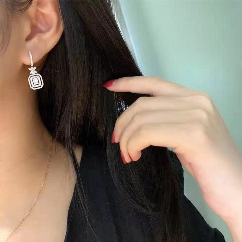 Jewels Galaxy Silver Plated American Diamond Studded Iconic Luxury Geometric Drop Earrings