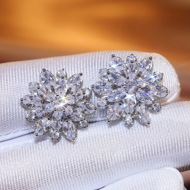 Jewels Galaxy Silver Plated American Diamond Studded Floral Silver Stud Earrings