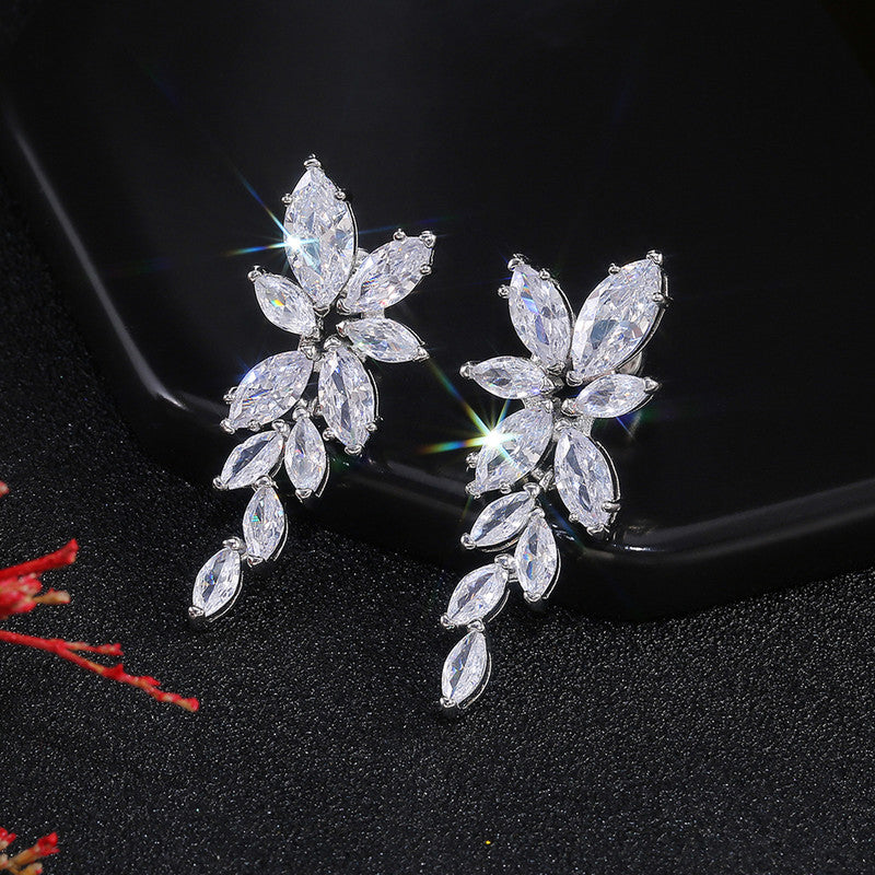 Jewels Galaxy Silver Plated American Diamond Studded Floral Themed Drop Earrings