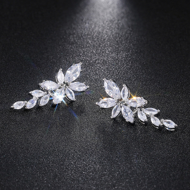 Jewels Galaxy Silver Plated American Diamond Studded Floral Themed Drop Earrings