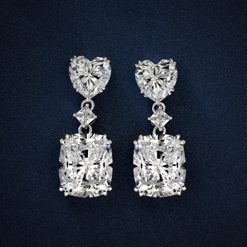 Jewels Galaxy Silver Plated AD Studded Silver Heart inspired Crushed Ice Cut Drop Earrings