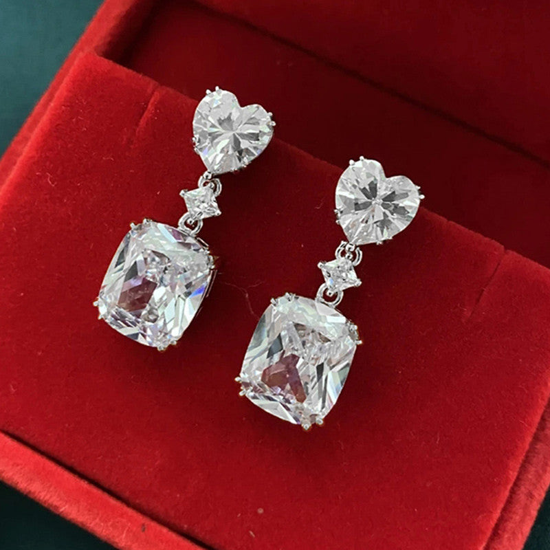 Jewels Galaxy Silver Plated AD Studded Silver Heart inspired Crushed Ice Cut Drop Earrings