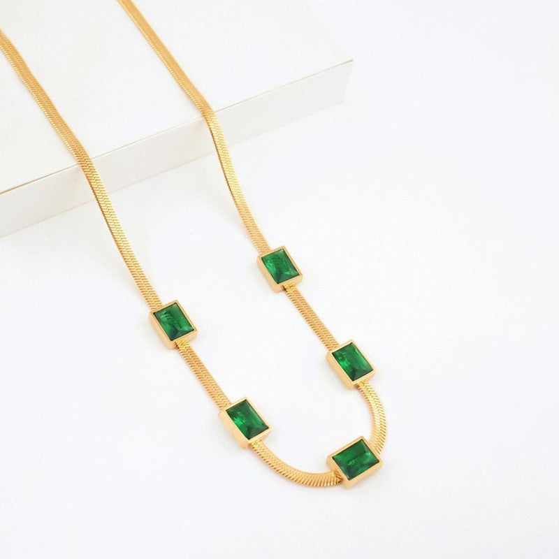 Jewels Galaxy Gold Plated Stainless Steel Anti Tarnish Snake Chain Green Emerald Studded Necklace
