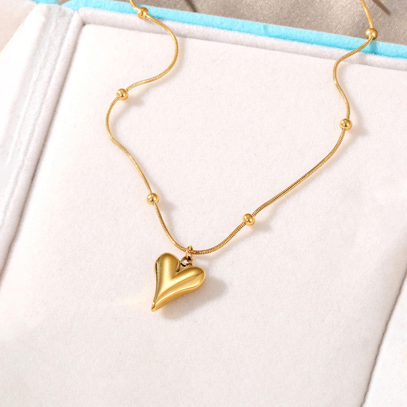 Jewels Galaxy Gold-Plated Anti Tarnish Heart themed Stainless Steel Pendant