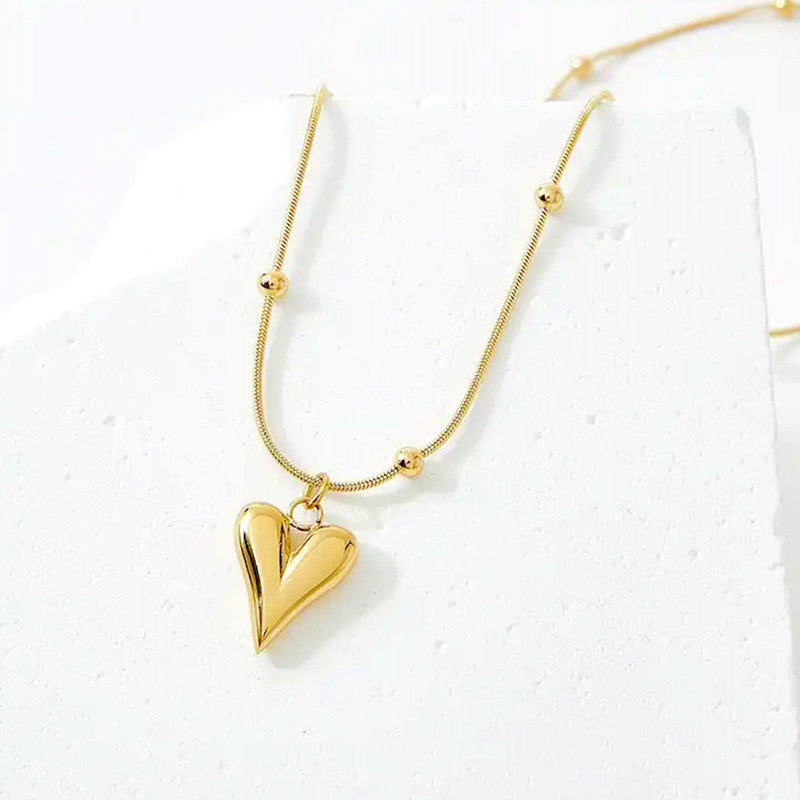 Jewels Galaxy Gold-Plated Anti Tarnish Heart themed Stainless Steel Pendant