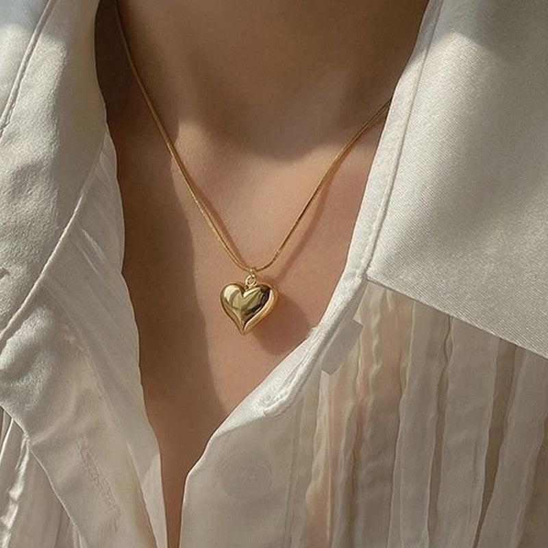 Jewels Galaxy Gold-Plated Anti Tarnish Heart Themed Pendant