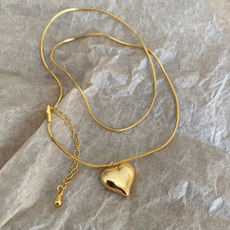 Jewels Galaxy Gold-Plated Anti Tarnish Heart Themed Pendant