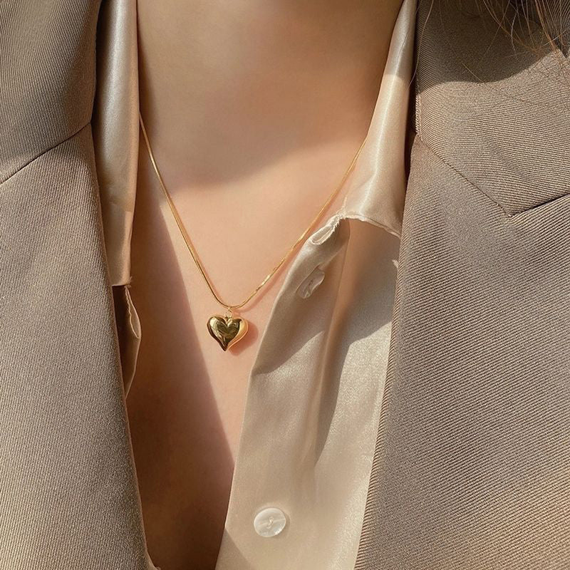 Jewels Galaxy Gold-Plated Anti Tarnish Heart Themed Pendant