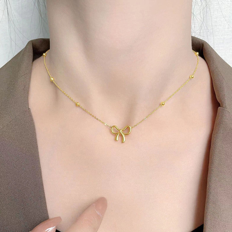 Jewels Galaxy Gold-Plated Anti Tarnish Infinity Bow Pendant