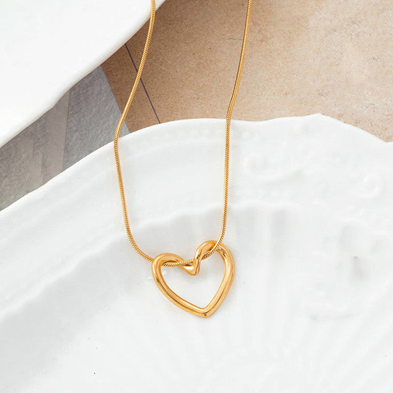 Jewels Galaxy Gold-Plated Anti Tarnish Heart Themed Pendant