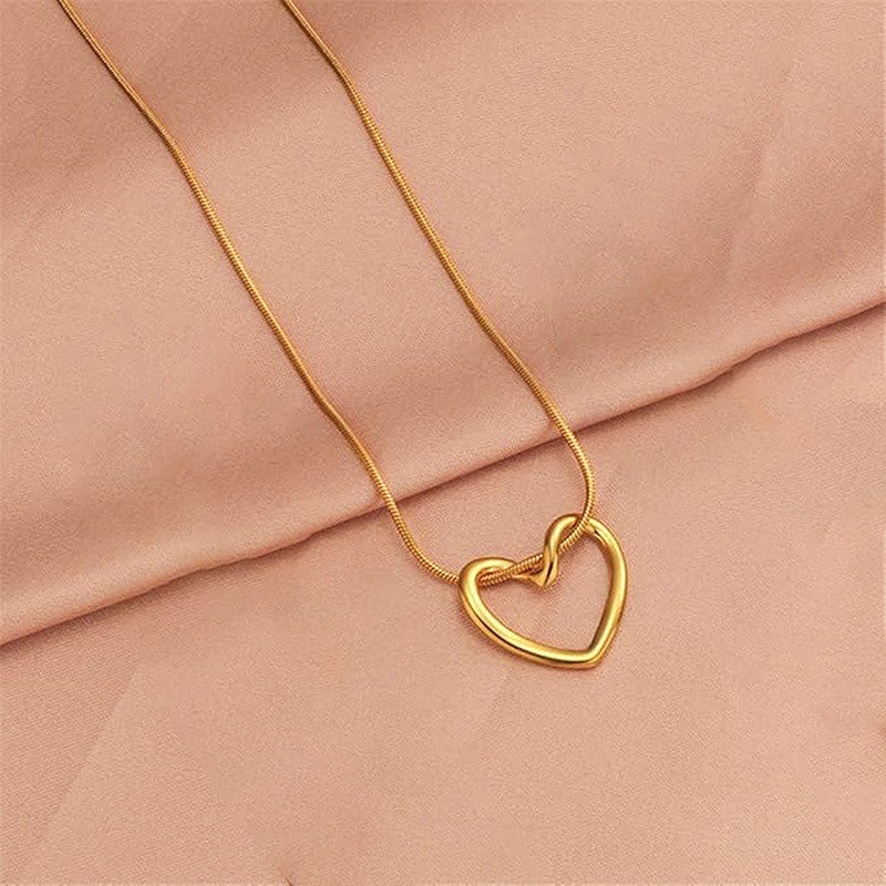 Jewels Galaxy Gold-Plated Anti Tarnish Heart Themed Pendant