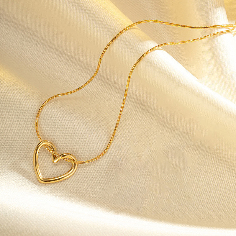 Jewels Galaxy Gold-Plated Anti Tarnish Heart Themed Pendant