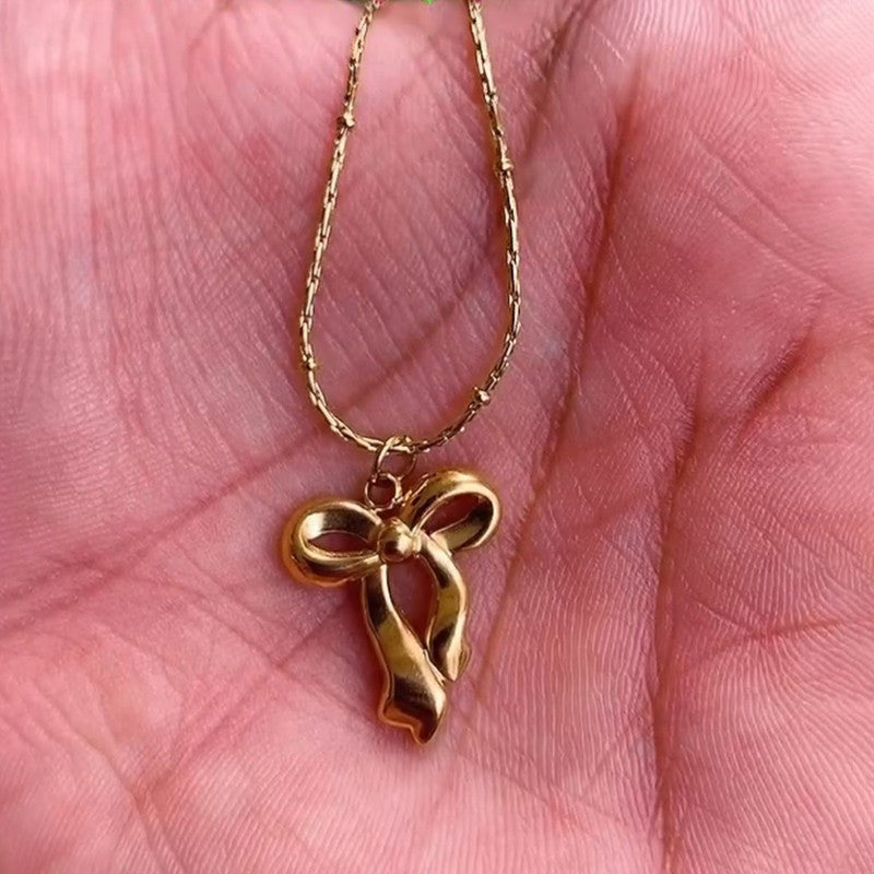 Jewels Galaxy Gold-Plated Anti Tarnish Infinity Bow Pendant