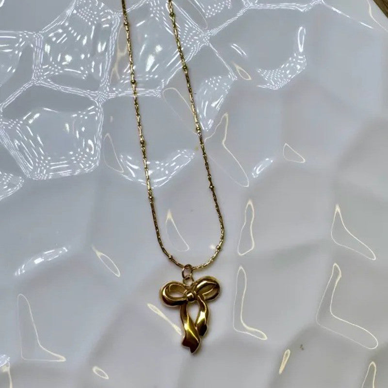 Jewels Galaxy Gold-Plated Anti Tarnish Infinity Bow Pendant
