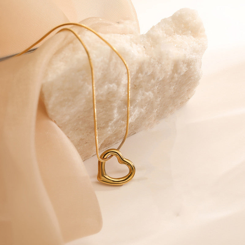 Jewels Galaxy Gold-Plated Anti Tarnish Heart Themed Pendant