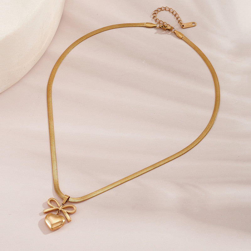 Jewels Galaxy Gold Plated Anti Tarnish Bow Knot Heart Themed Pendant