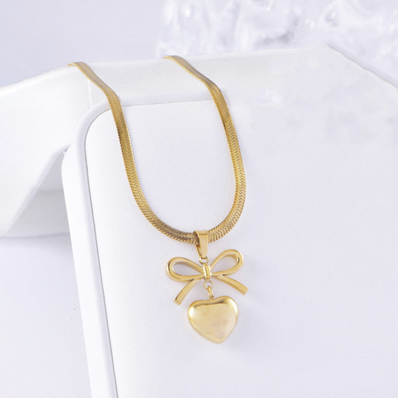 Jewels Galaxy Gold Plated Anti Tarnish Bow Knot Heart Themed Pendant