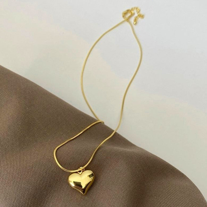 Jewels Galaxy Gold-Plated Anti Tarnish Heart Themed Pendant