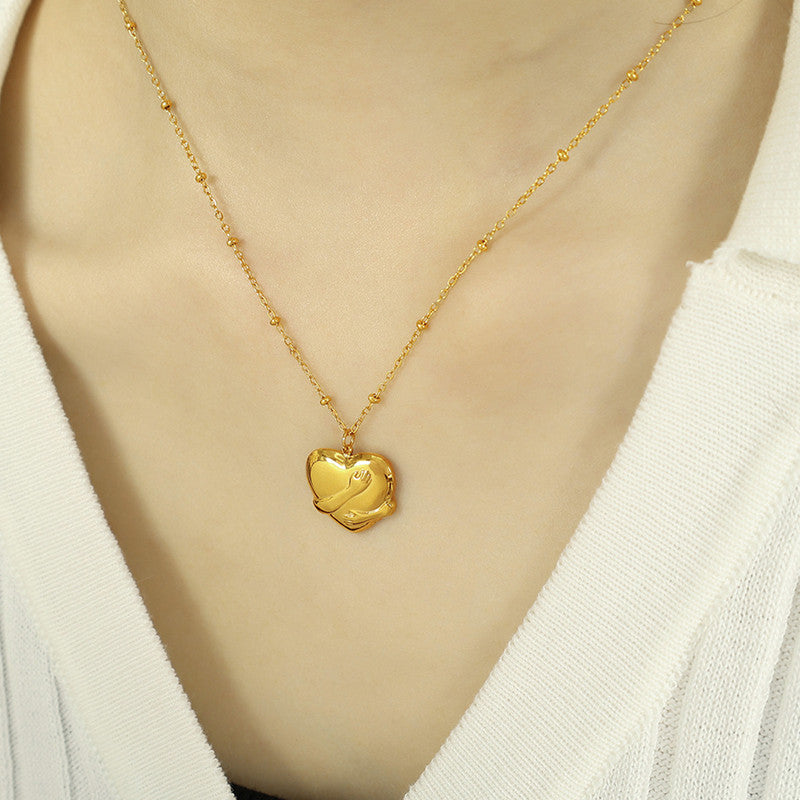 Jewels Galaxy Gold-Plated Anti Tarnish Heart Themed Pendant