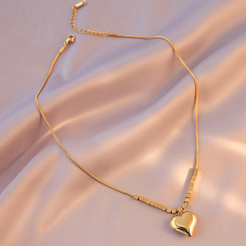 Jewels Galaxy Gold-Plated Anti Tarnish Heart Themed Pendant