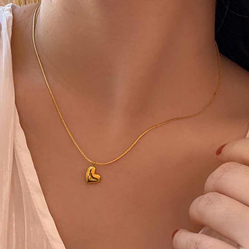 Jewels Galaxy Gold-Plated Anti Tarnish Heart Themed Pendant