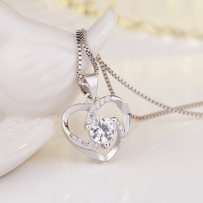 Jewels Galaxy Silver Plated Anti Tarnish American Diamond Studded Heart Themed Pendant