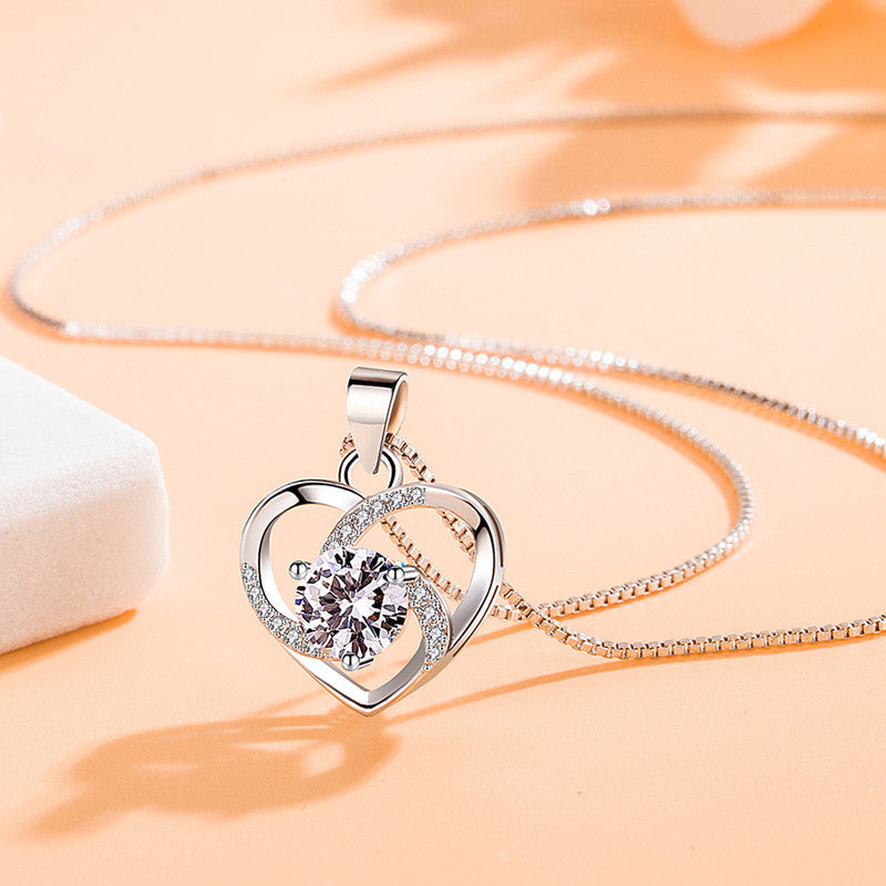 Jewels Galaxy Silver Plated Anti Tarnish American Diamond Studded Heart Themed Pendant