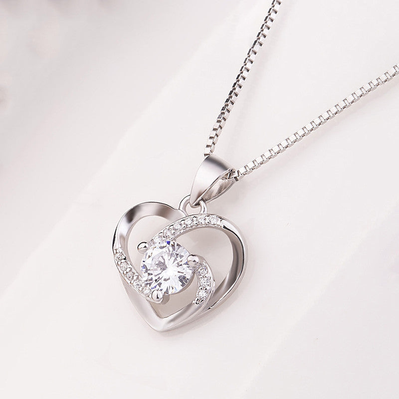 Jewels Galaxy Silver Plated Anti Tarnish American Diamond Studded Heart Themed Pendant