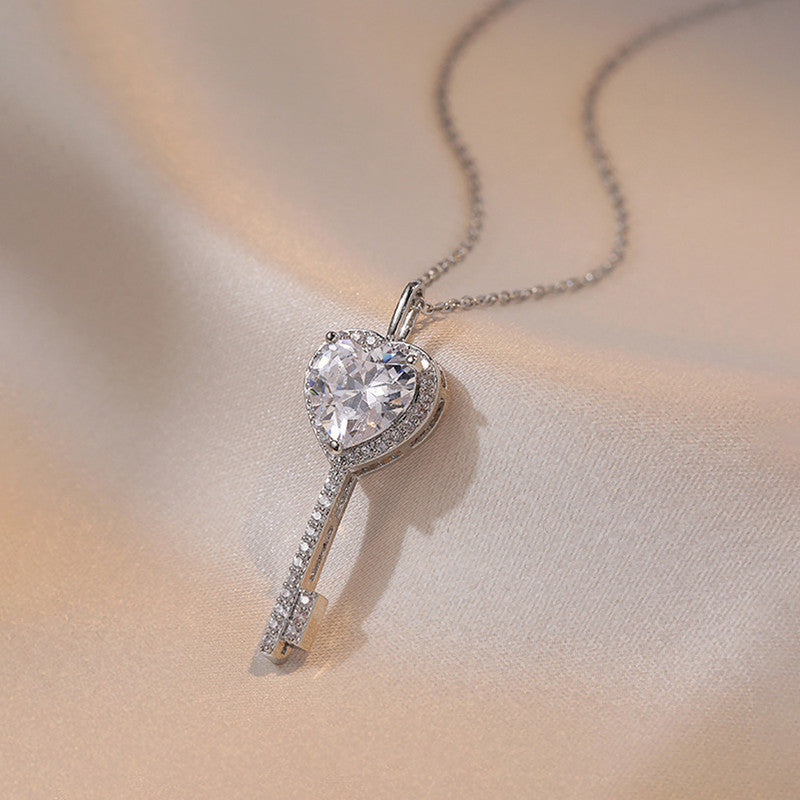 Jewels Galaxy Silver Plated Anti Tarnish American Diamond Studded Heart Key Pendant