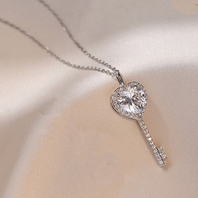 Jewels Galaxy Silver Plated Anti Tarnish American Diamond Studded Heart Key Pendant