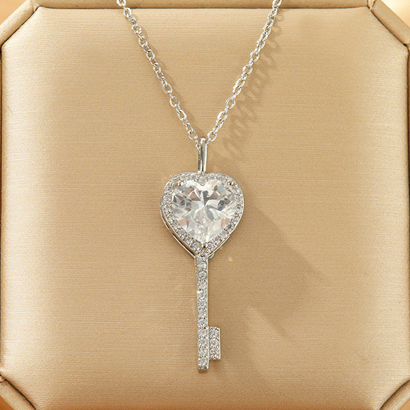 Jewels Galaxy Silver Plated Anti Tarnish American Diamond Studded Heart Key Pendant