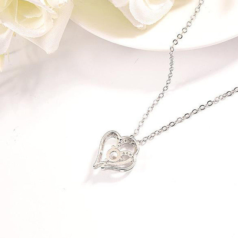 Jewels Galaxy Silver Plated Anti Tarnish American Diamond Studded Heart Themed Pendant