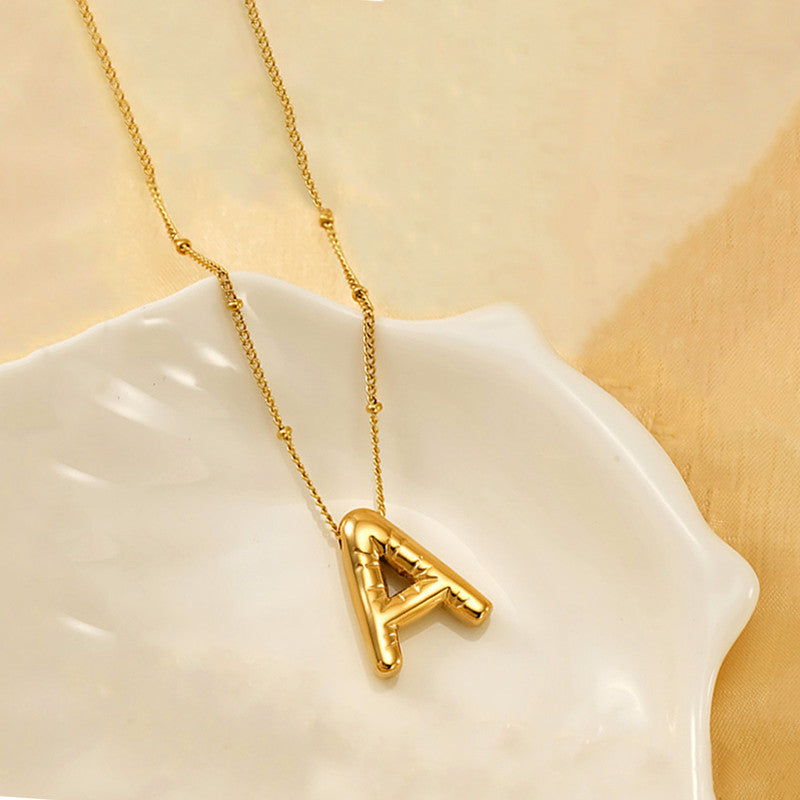 Jewels Galaxy Gold Plated Anti Tarnish Stainless Steel Alphabetical Pendant
