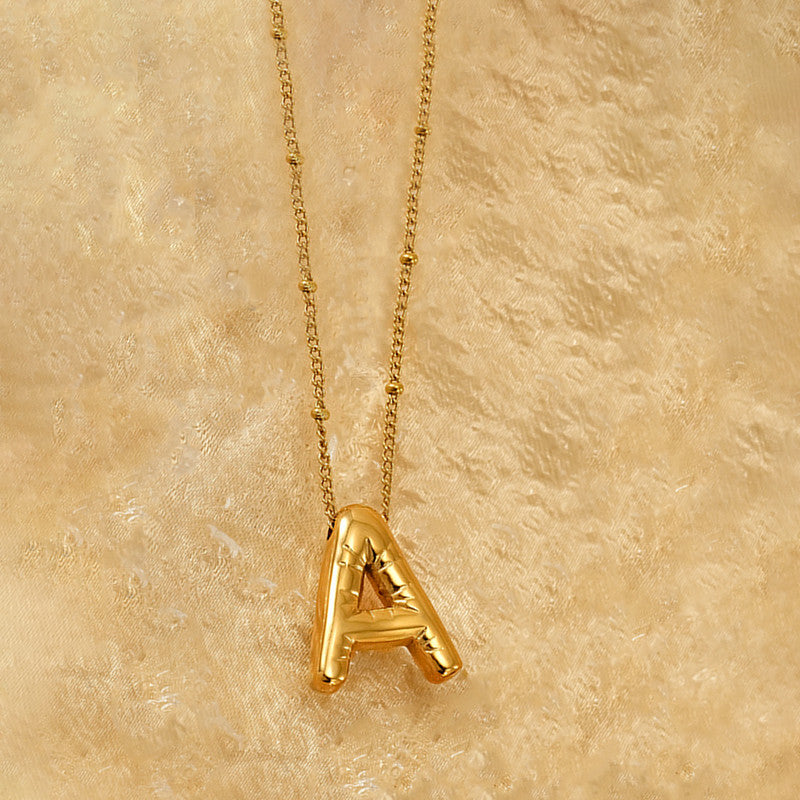 Jewels Galaxy Gold Plated Anti Tarnish Stainless Steel Alphabetical Pendant