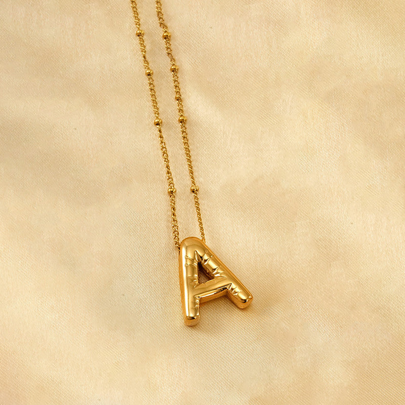 Jewels Galaxy Gold Plated Anti Tarnish Stainless Steel Alphabetical Pendant