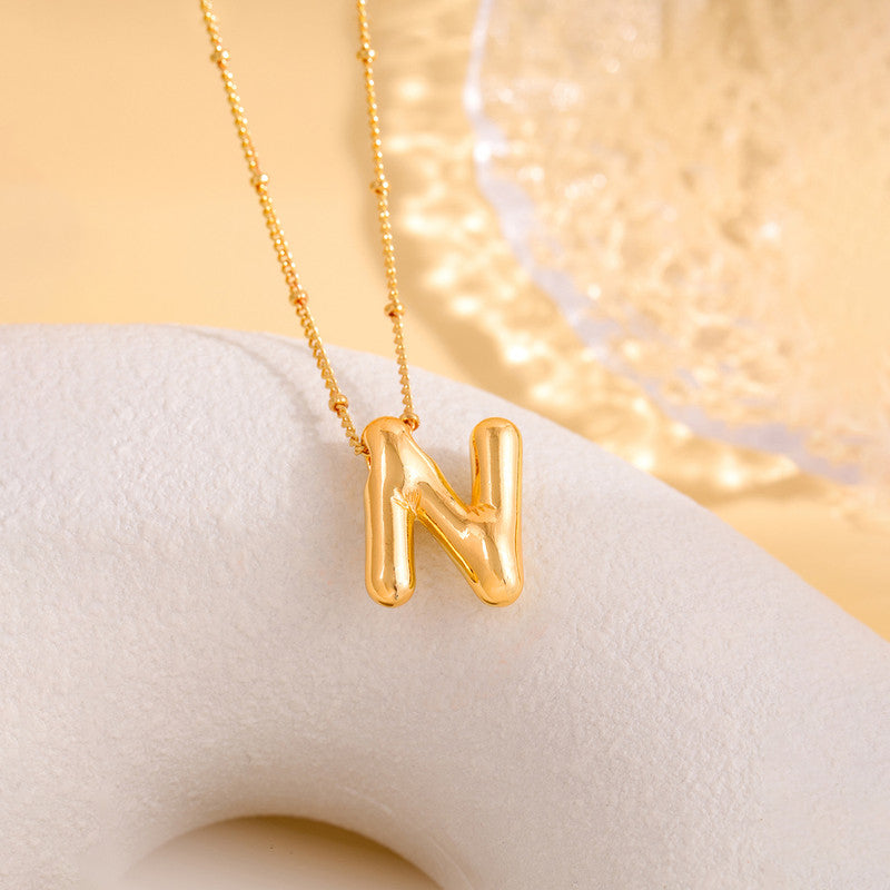 Jewels Galaxy Gold Plated Anti Tarnish Stainless Steel Alphabetical Pendant