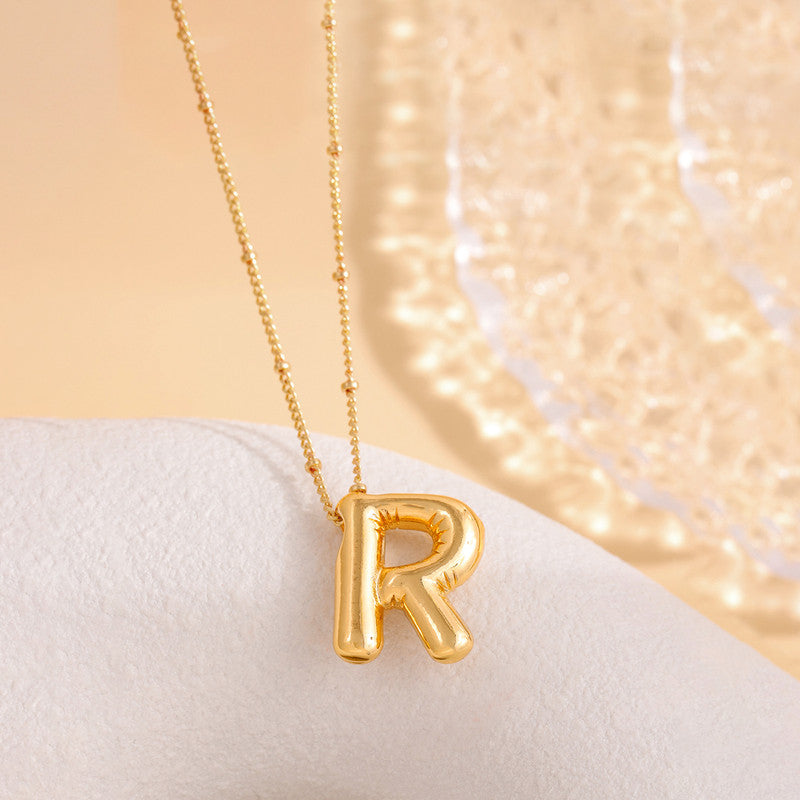 Jewels Galaxy Gold Plated Anti Tarnish Stainless Steel Alphabetical Pendant