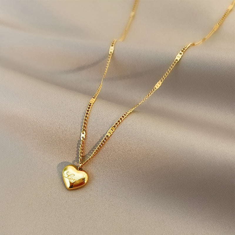 Jewels Galaxy Gold Plated Stainless Steel Anti Tarnish Heart Themed Pendant For Women