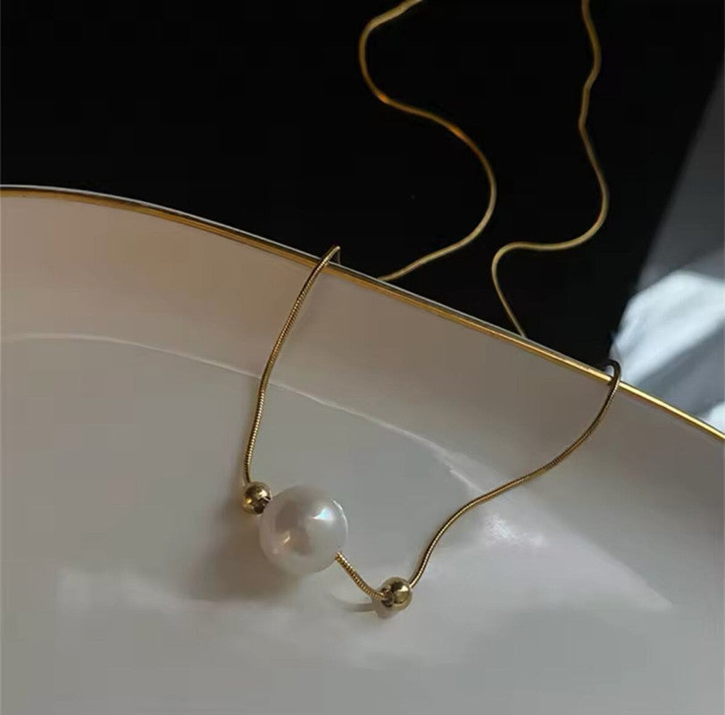 Jewels Galaxy Gold Plated Stainless Steel Anti Tarnish Pearl Pendant