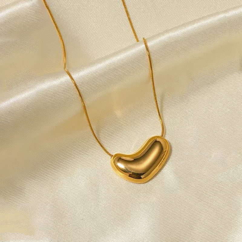 Jewels Galaxy Gold Plated Stainless Steel Anti Tarnish Golden Bean Pendant