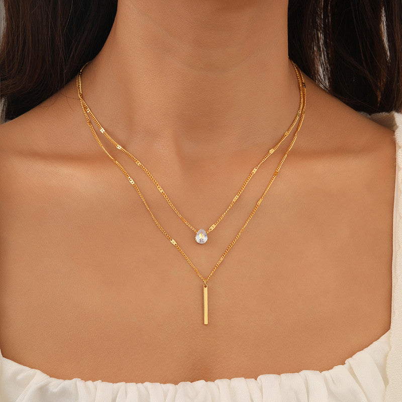 Jewels Galaxy Gold Plated Stainless Steel Anti Tarnish Tear Drop CZ Dual Strand Pendant