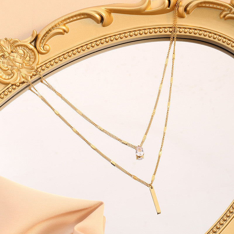Jewels Galaxy Gold Plated Stainless Steel Anti Tarnish Tear Drop CZ Dual Strand Pendant
