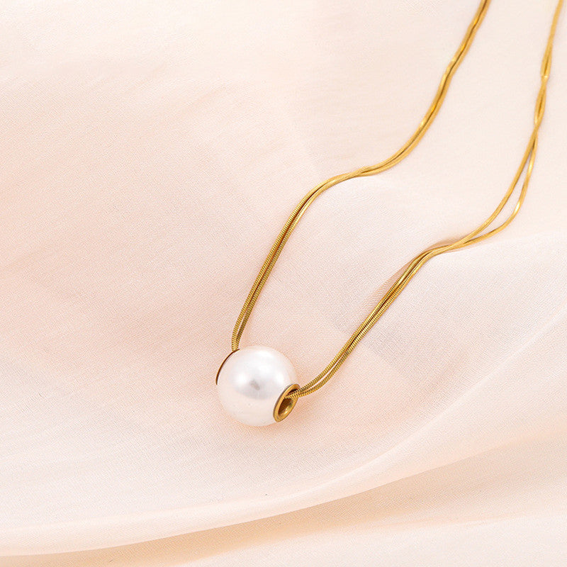 Jewels Galaxy Gold Plated Stainless Steel Anti Tarnish Pearl Studded Pendant
